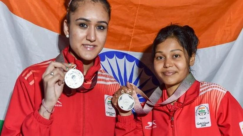Manika Batra, M Das, CWG 2018 India's Manika Batra and M Das show their silver medals at the medal ceremony of Table Tennis women's doubles event at the Commonwealth Games 2018 in Gold Coast. Photo: PTI
