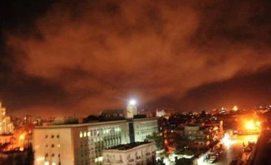 US, allies attack Syria; Iran warns of regional consequences: Top updates Lasers and smoke seen over Damascus