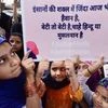 School and Madarsa students display placards as they protest over government's alleged 'inaction' in Kathua and Unnao rape cases, in Ahmedabad on Sunday