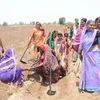 Women in Mamdapur, Parli, Beed digging the ground as part of the Shramdaan contribution for the water harvesting initiative of the Global Parle campaign