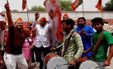 Karnataka poll: Welfare high on the agenda in Congress, JD(s)' manifestos BJP workers on streets