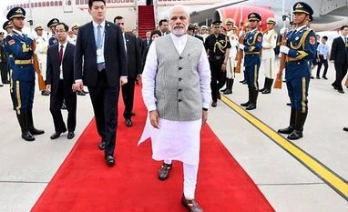 Connectivity with neighbourhood and in SCO region India's priority: PM Modi Prime Minister Narendra Modi arrives in China's Qingdao for the SCO Summit