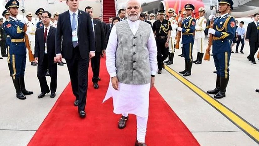Prime Minister Narendra Modi arrives in China's Qingdao for the SCO Summit Prime Minister Narendra Modi arrives in China's Qingdao for the SCO Summit