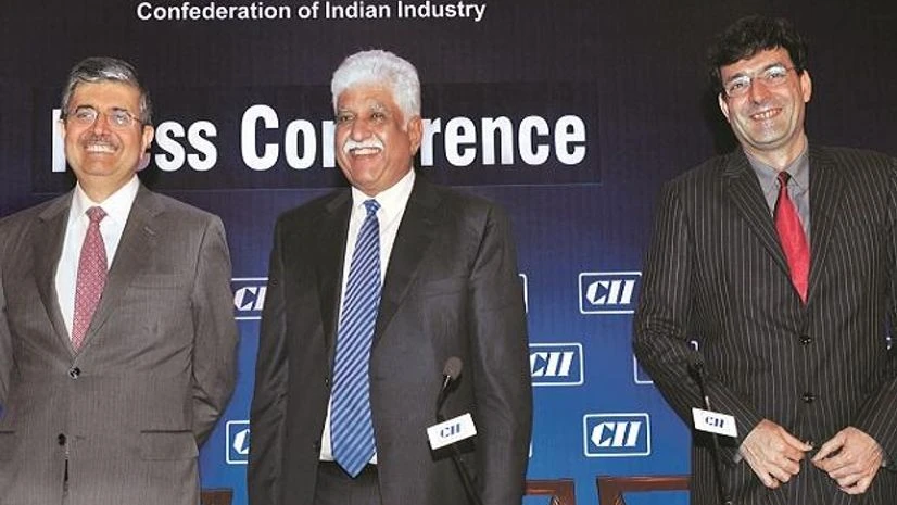 CII, Uday Kotak, Rakesh Bharti Mittal, Piruz Khambatta (From left) CII President-designate Uday Kotak and President Rakesh Bharti Mittal, with Chairman, CII Western Region, Piruz Khambatta at the industry body’s press conference in Mumbai. Photo: Kamlesh Pednekar