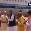 Chhattisgarh CM Raman Singh receives PM Narendra Modi at the Swami Vivekanand Airport in Raipur
