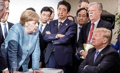 Trump says he gets along well with world leaders, tweets G7 photos as proof trump merkel, G7