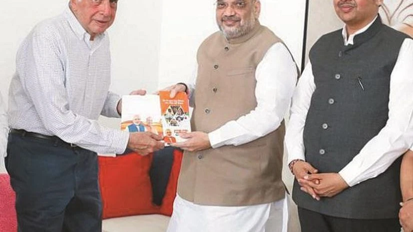 Amit Shah, Ratan Tata, Devendra Fadnavis Amit Shah (centre) had met Ratan Tata (left) following advice from Devendra Fadnavis
