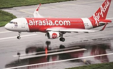 Ex-CEO Mittu Chandilya challenges AirAsia brand-licensing deal Air Asia new ad campaign