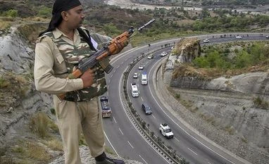 Over 32,200 paramilitary personnel infected by coronavirus so far: Govt A paramilitary soldier stands guard | Photo: PTI