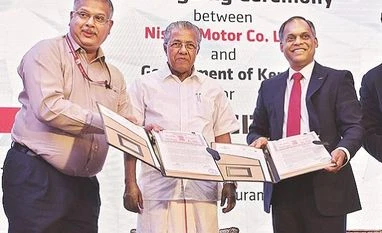 nissan, MoU From left: Kerala Chief Secretary Paul Antony, Chief Minister Pinarayi Vijayan and Nissan Chief Information Officer Tony Thomas during the signing of the MoU in Chennai on Friday.