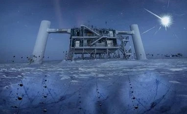 south pole lab, icecube In this artistic composition, based on a real image of the IceCube Lab at the South Pole, a distant source emits neutrinos that are detected below the ice by IceCube sensors, called DOMs