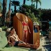A bizarre sunscreen booth is driving cocktail sales at hotel pools