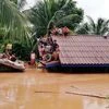 Villagers evacuate after the Xepian-Xe Nam Noy hydropower dam collapsed in Attapeu province, Laos. Photo: Reuters