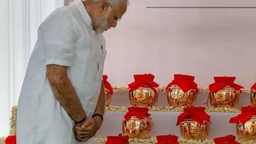 New Delhi: Prime Minister Narendra Modi during handing over of the ashes ('Asthi Kalash') of former prime minister Atal Bihari Vajpayee to all BJP state presidents for immersion in their respective states, at the party headquarters in New Delhi on We New Delhi: Prime Minister Narendra Modi during handing over of the ashes ('Asthi Kalash') of former prime minister Atal Bihari Vajpayee to all BJP state presidents for immersion in their respective states, at the party headquarters in New Delhi on We