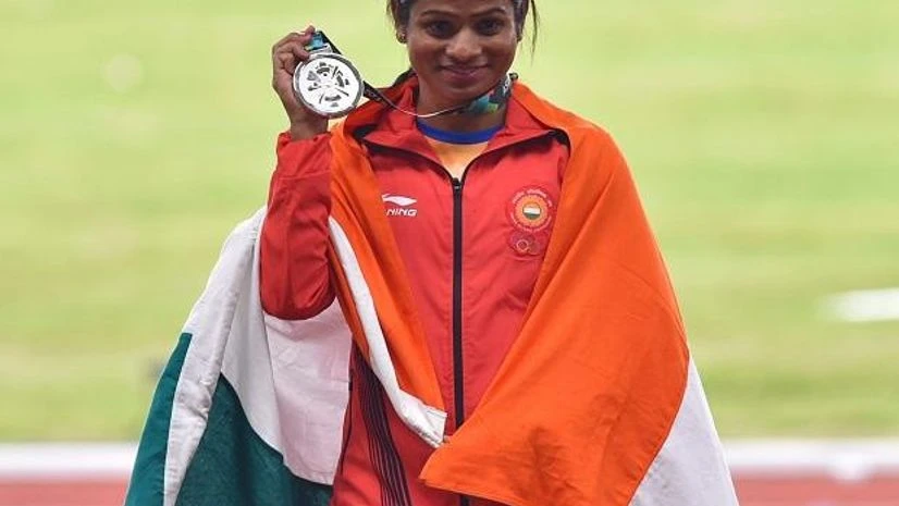 Asian Games 2018, Dutee Chand ilver medal winner Indian athlete Dutee Chand at a medal ceremony of women's 100m final track event at the 18th Asian Games 2018. Photo: PTI
