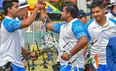 Administrative overhaul brings new hope for India's off-target archery Indian archers Rajat Chauhan, Aman Saini and Abhishek Verma celebrate after scoring points in men's compound team event, at the Asian Games 2018. Photo: PTI