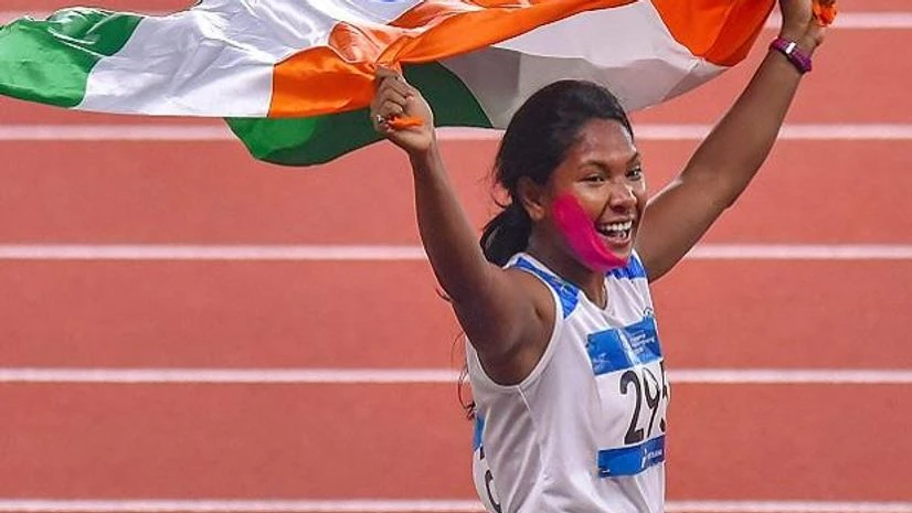 Swapna Barman, asian games Jakarta: Indian athlete Swapna Barman celebrates after winning the gold medal in the women's Heptathlon event at the 18th Asian Games, in Jakarta, Indonesia on Wednesday, Aug 29, 2018. Photo: PTI
