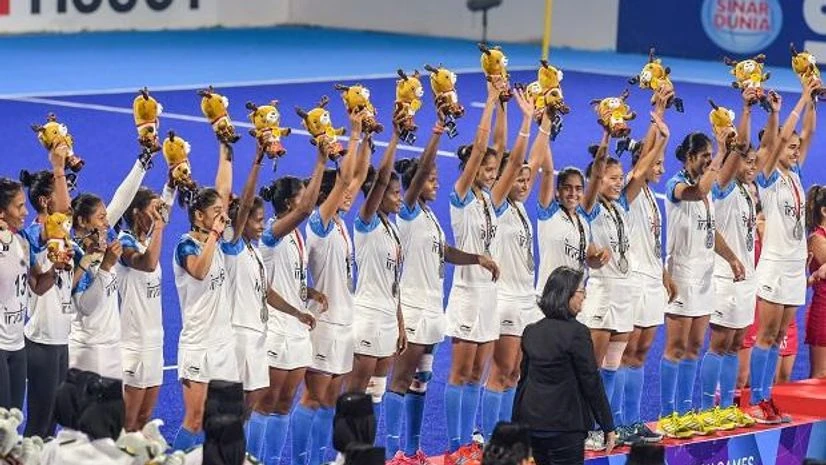 Silver medal winning Indian women's hockey team celebrates during the medal ceremony at the 18th Asian Games 2018, in Jakarta. Photo: PTI Silver medal winning Indian women's hockey team celebrates during the medal ceremony at the 18th Asian Games 2018, in Jakarta. Photo: PTI
