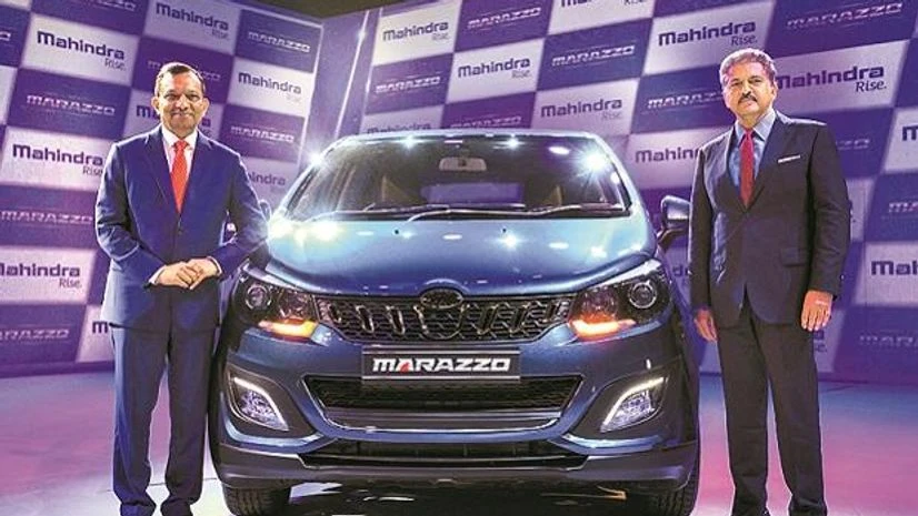 M&M Executive Chairperson Anand Mahindra with Managing Director Pawan Goenka at the launch of Mahindra Marazzo multi-purpose vehicle, in Nashik on Monday. The car's prices starts from Rs 999,000 | Photo: PTI M&M Executive Chairperson Anand Mahindra with Managing Director Pawan Goenka at the launch of Mahindra Marazzo multi-purpose vehicle, in Nashik on Monday. The car's prices starts from Rs 999,000 | Photo: PTI