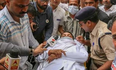 Hardik Patel shifted to hospital on 14th day of quota fast in Gujarat Doctors and police personnel monitor Patidar Anamat Andolan Samiti (PAAS) leader Hardik Patel's health a she is taken to be admitted into a hospital, in Ahmedabad