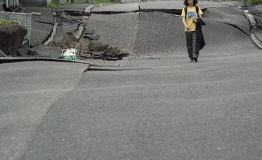 How does Japan define 2018? With a Chinese character meaning 'disaster' Japan earthquake