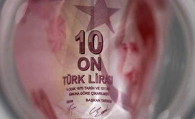 Turkey's lira sinks to fresh low, prompting bank to intervene Lira, turkey, currency