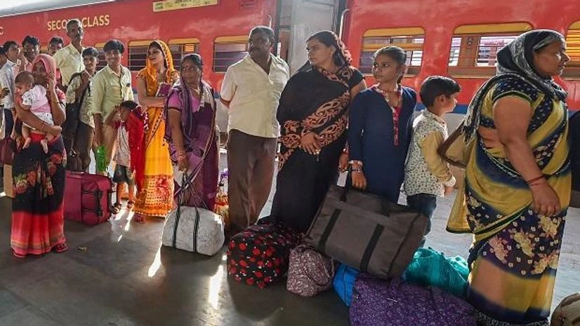 Migrants in Gujarat, Fleeing Migrants, Gujarat Violence Ahmedabad: Migrant workers wait to board a train out of Gujarat in view of protests and violence breaking out over the alleged rape of a 14-month-old girl Tuesday, October 9, 2018. Photo: PTI