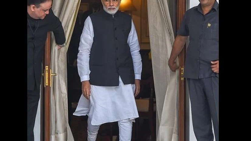 modi Prime Minister Narendra Modi arrives for a meeting with his Sri Lankan counterpart Ranil Wickremesinghe at Hyderabad House, in New Delhi, Saturday