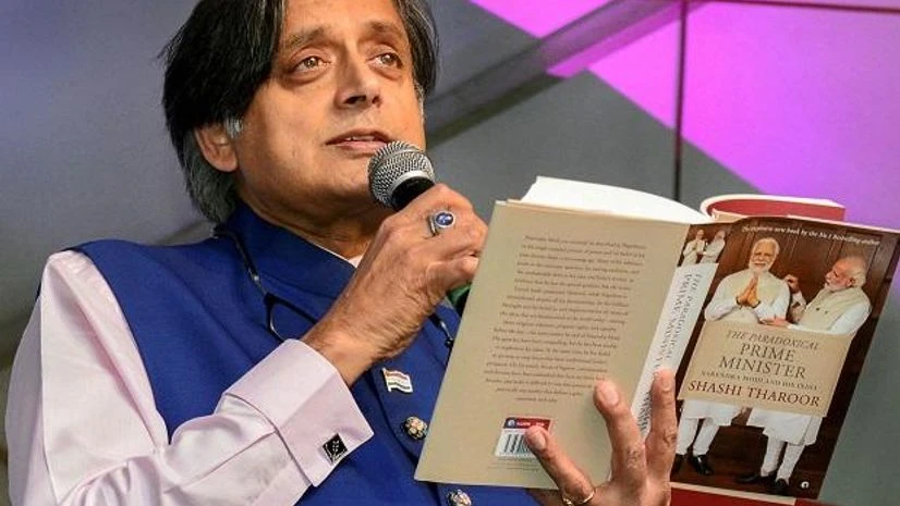 Congress MP Shashi Tharoor reads an excerpt from his latest book, The Paradoxical Prime Minister, during the 7th edition of 'Bangalore Literature Festival' (BLF), in Bengaluru on Sunday | Photo: PTI Shashi Tharoor