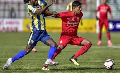 Real Kashmir FC Players of Real Kashmir FC (in yellow jersey) and Churchill Brothers FC in action during their I-League match, in Srinagar, Tuesday, November 6, 2018. (Photo: PTI)