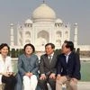 South Korean First Lady Kim Jung-sook with her delegation pose  for a photograph during their visit to Taj Mahal, in Agra, Wednesday