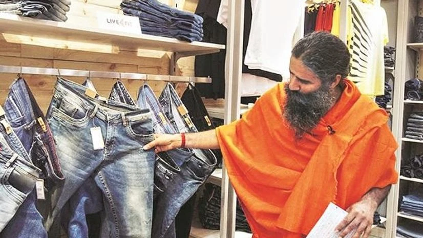 Patanjali apparels, patanjali, patanjali paridhan Ramdev at the launch of Patanjali Paridhan store in New Delhi earlier this week. Photo: Twitter