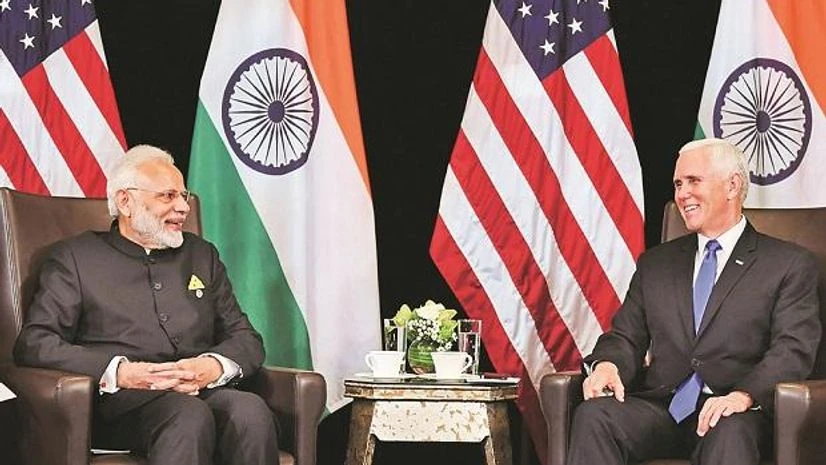 Narendra Modi, Michael Pence PM Narendra Modi (left) and US Vice-President Michael Pence in Singapore on Wednesday (Photo: PTI)