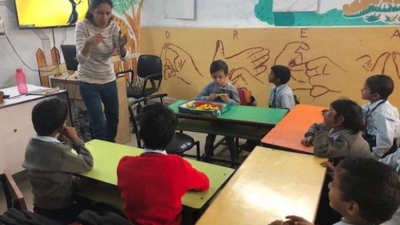 . Kindergarten students attend a class at the Noida Deaf Society, a not-for-profit that works with the speech and hearing impaired