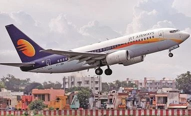 Jet Q3 net loss at Rs 587.77 cr; board approves debt resolution plan Jet Airways