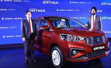 Maruti Suzuki rolls out Ertiga 2018: Price, specifications and sale details Maruti Suzuki MD and CEO, Kenichi Ayukawa(L), and Senior Executive Director (Marketing and Sales), RS Kalsi, at the launch of Maruti Suzuki Ertiga 2018