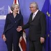 theresa may, UK Pm , May, brexit, EU, brussels, President Jean-Claude Juncker