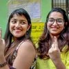First time voters  show their fingers marked with indelible ink after casting votes for the Assembly elections, at a polling station in Bhopal, Madhya Pradesh. Photo: PTI