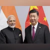 Prime Minister Narendra Modi shakes hands with Chinese President Xi Jinping on the sidelines of G-20 summit, in Buenos Aires, Friday. (PIB Photo via PTI)