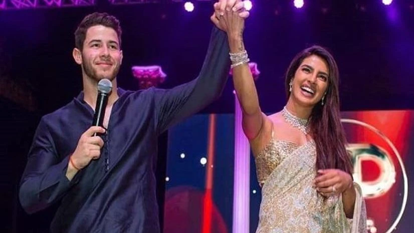 Priyanka Chopra, Nick Jonas Jodhpur: Bollywood actress Priyanka Chopra, right and Nick Jonas during a ceremony before their wedding, at Umaid Bhawan in Jodhpur. (Photo: AP/PTI)