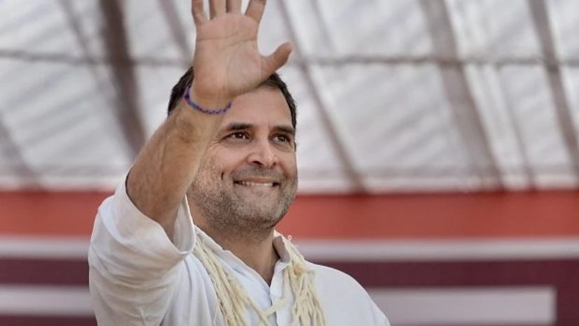 rahul gandhi Congress President Rahul Gandhi waves at the crowd during an election campaign ahead of Assembly elections at Malakhera, Alwar district in Rajasthan | Photo: PTI