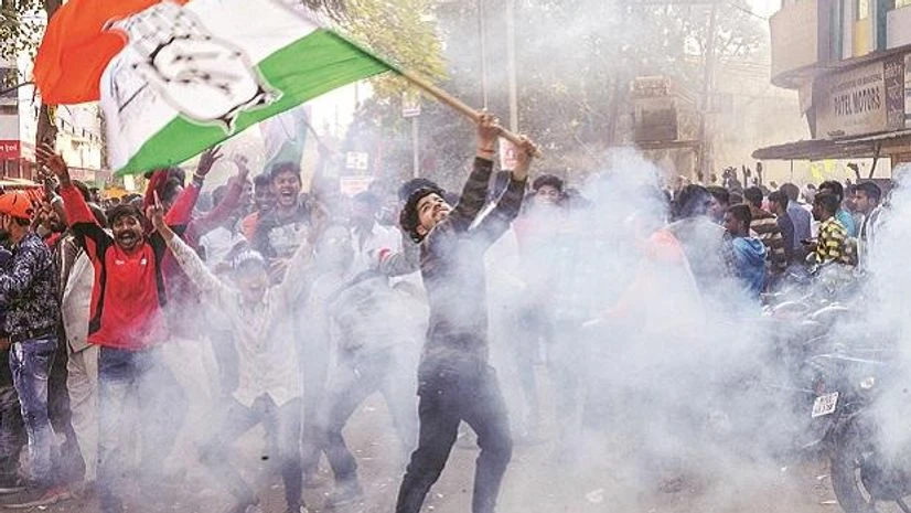 Congress supporters celebrate win People celebrate the Congress’ win in Assembly elections in Rajasthan, Chhattisgarh and Madhya Pradesh, in Jabalpur on Tuesday. (Photo: PTI)