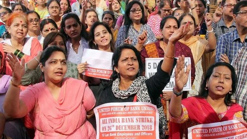 Bank strike Bank employees stage a protest against the proposed merger of Vijaya Bank and Dena Bank with Bank of Baroda, during a nation-wide strike, in Mumbai on Wednesday, 26th Dec 2018 (Photo: Kamlesh Pednekar)