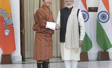PM Modi to visit Bhutan on Aug 17-18, discuss hydropower projects rime Minister Narendra Modi shakes hands with his Bhutanese counterpart Lotay Tshering before their meeting at Hyderabad House, in New Delhi
