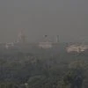 A view of the Rashtrapati Bhawan, South and North Block buildings enveloped in a blanket of smog, caused by a mixture of pollution and fog, in New Delhi, Saturday (Photo: PTI)