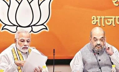 BJP may fall 15 seats short of magic mark of 272 in Lok Sabha, says survey modi and shah