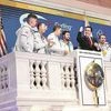 The Olympic Gold winning team rings the opening bell at the New York Stock Exchange