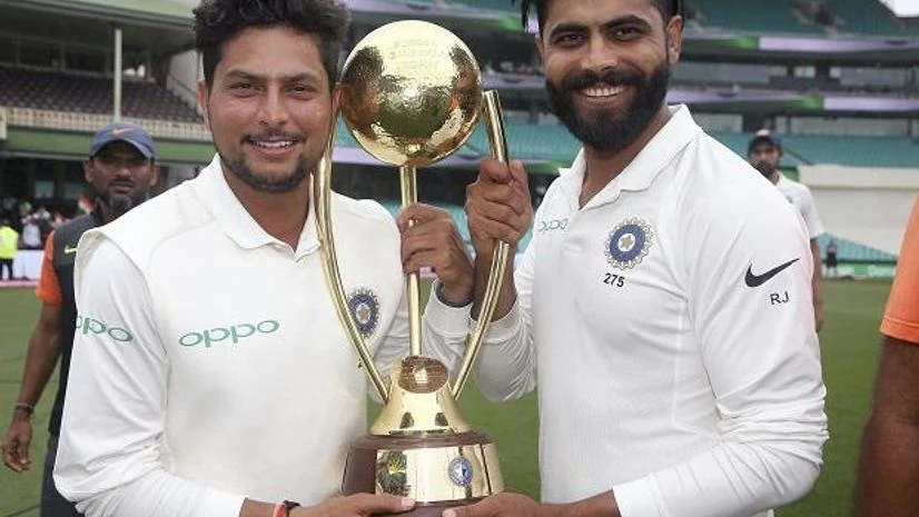File photo: India's Kuldeep Yadav, left, and Ravindra Jadeja hold the Border-Gavaskar Trophy File photo: India's Kuldeep Yadav, left, and Ravindra Jadeja hold the Border-Gavaskar Trophy