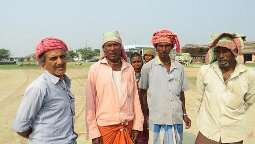 fishermen Fishing boats at the parking bay in Kakdwip; retired fishermen who earn a living by weaving nets, earning Rs 250 a day