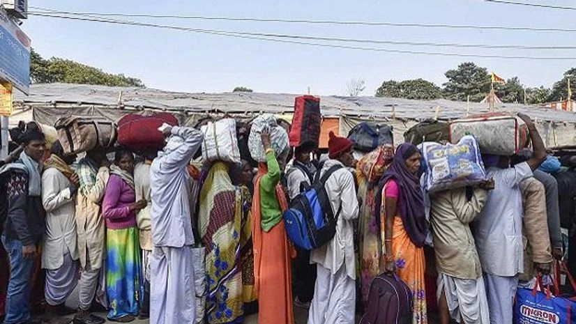File photo Pilgrims wait to board their buses at Babughat transit camp on their way to Gangasagar Mela, in Kolkata